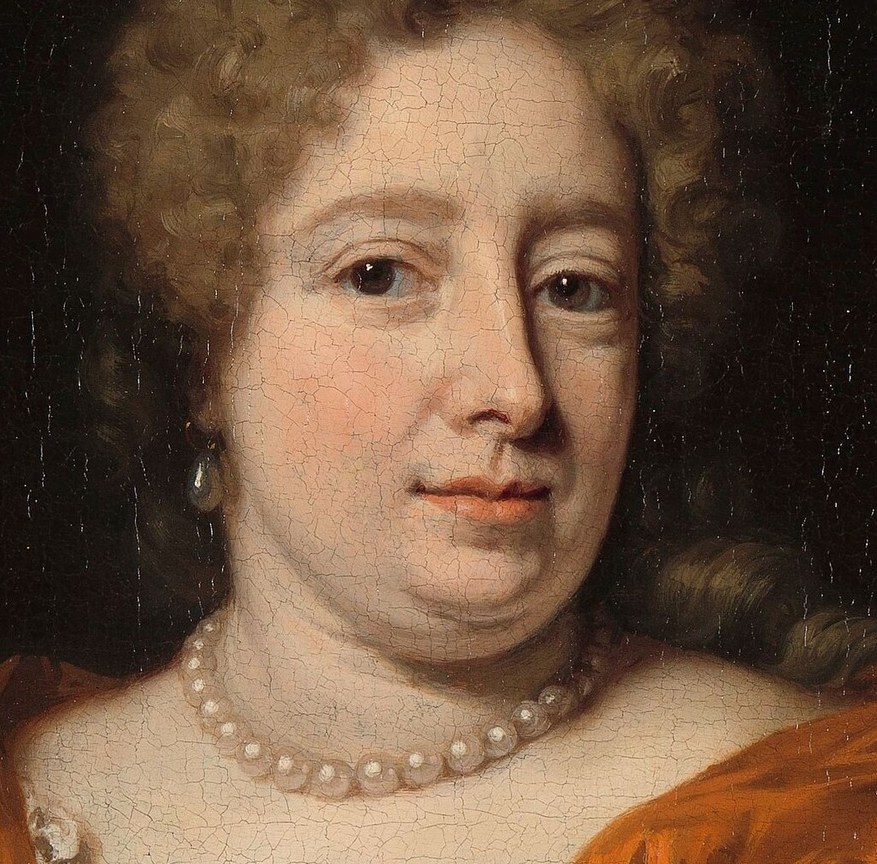 Her direct gaze and subtle smile convey a sense of calm confidence and inner life.