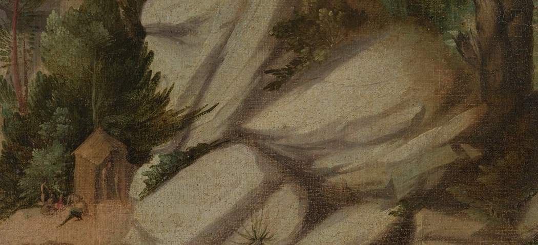 Its imposing presence and textured surface create a dramatic backdrop and a sense of natural grandeur.