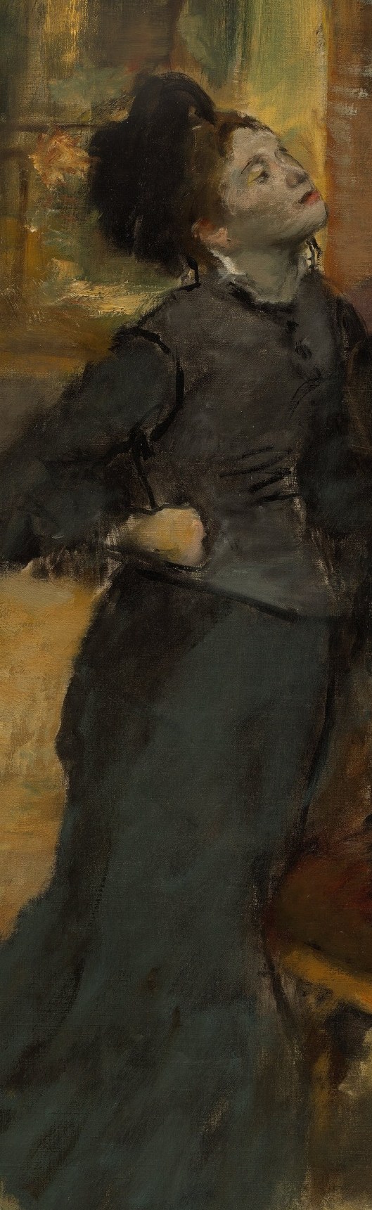 This woman in a museum seems to be looking up at something.