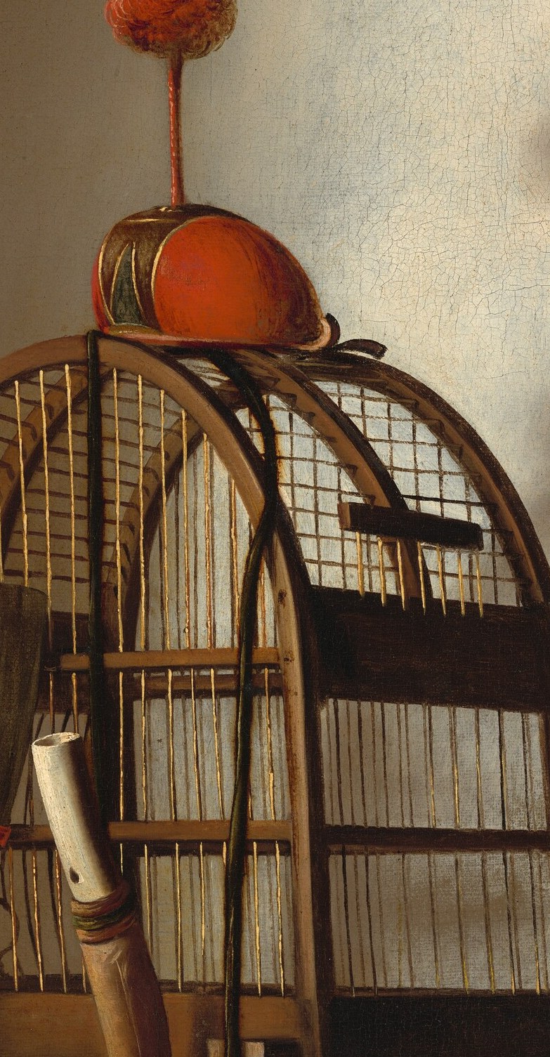 The intricate bars and open door hint at confinement and the potential for freedom, a common theme in still life.