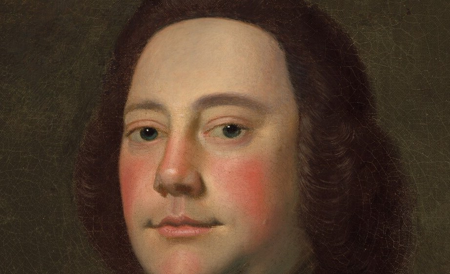 His direct gaze means he's confident, even formidable.