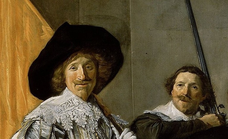 The captain's face is direct, vivid, alive.