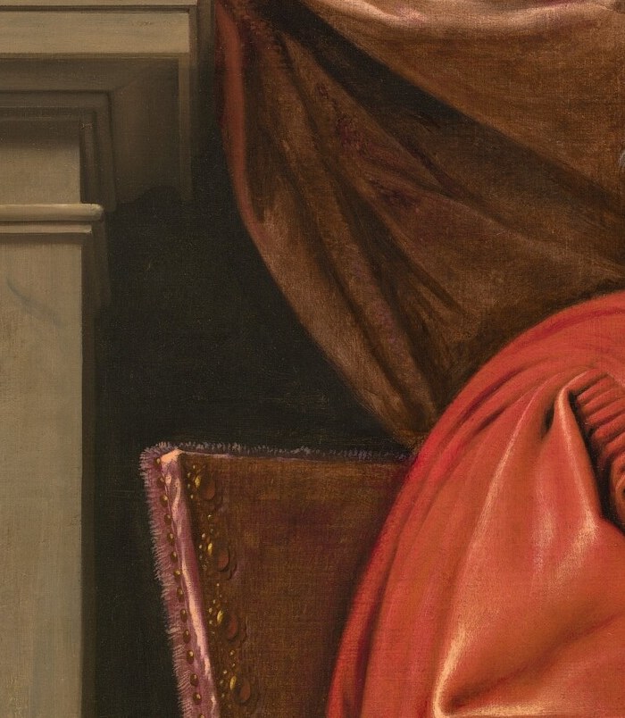 Notice how the painter models the heavy silk with light.