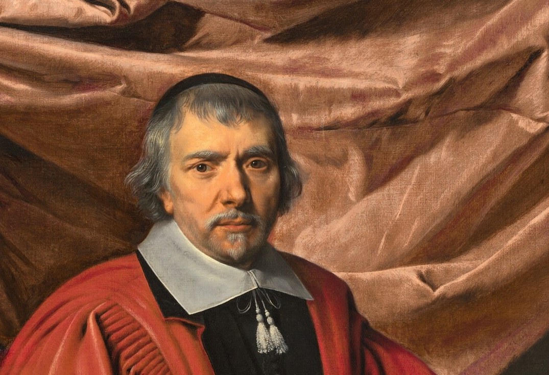 His white rabat collar marked his rank as Avocat Général.