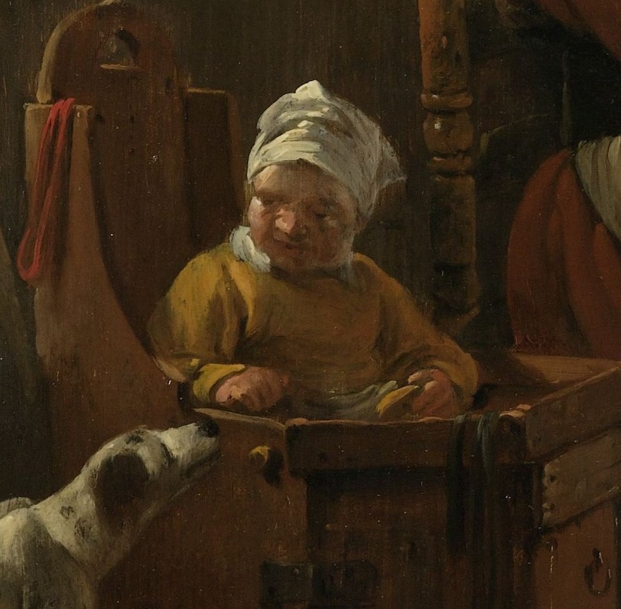 A child beside a woman at her spinning wheel.