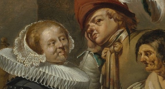 She wears a golden-yellow dress. He wears an elaborate ruff.