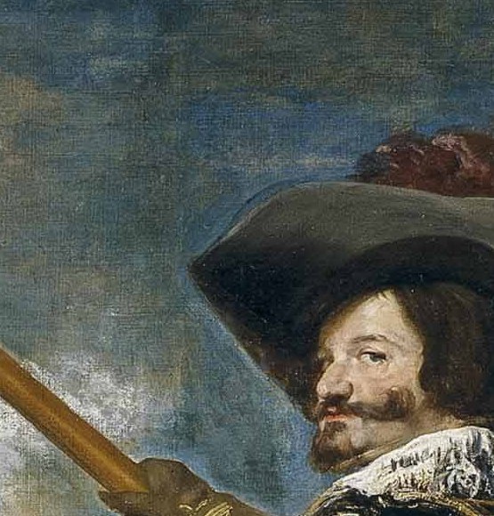 The dark, imposing hat frames his face and adds to his regal, powerful silhouette.