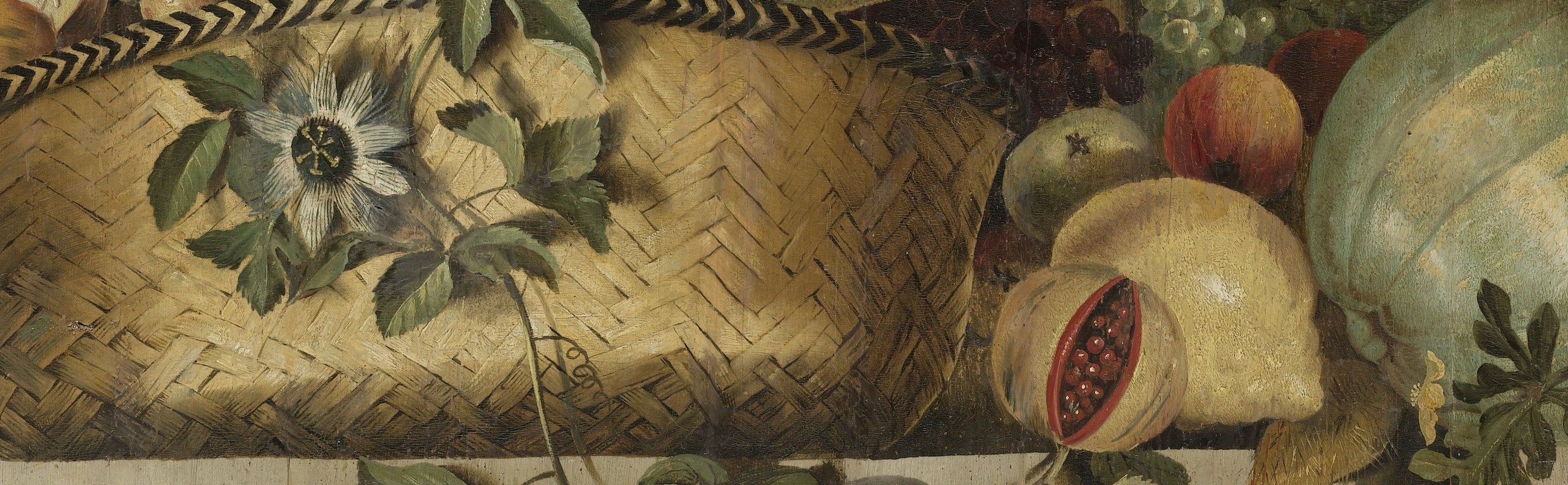 Woven reed, a black and white chevron around the rim.