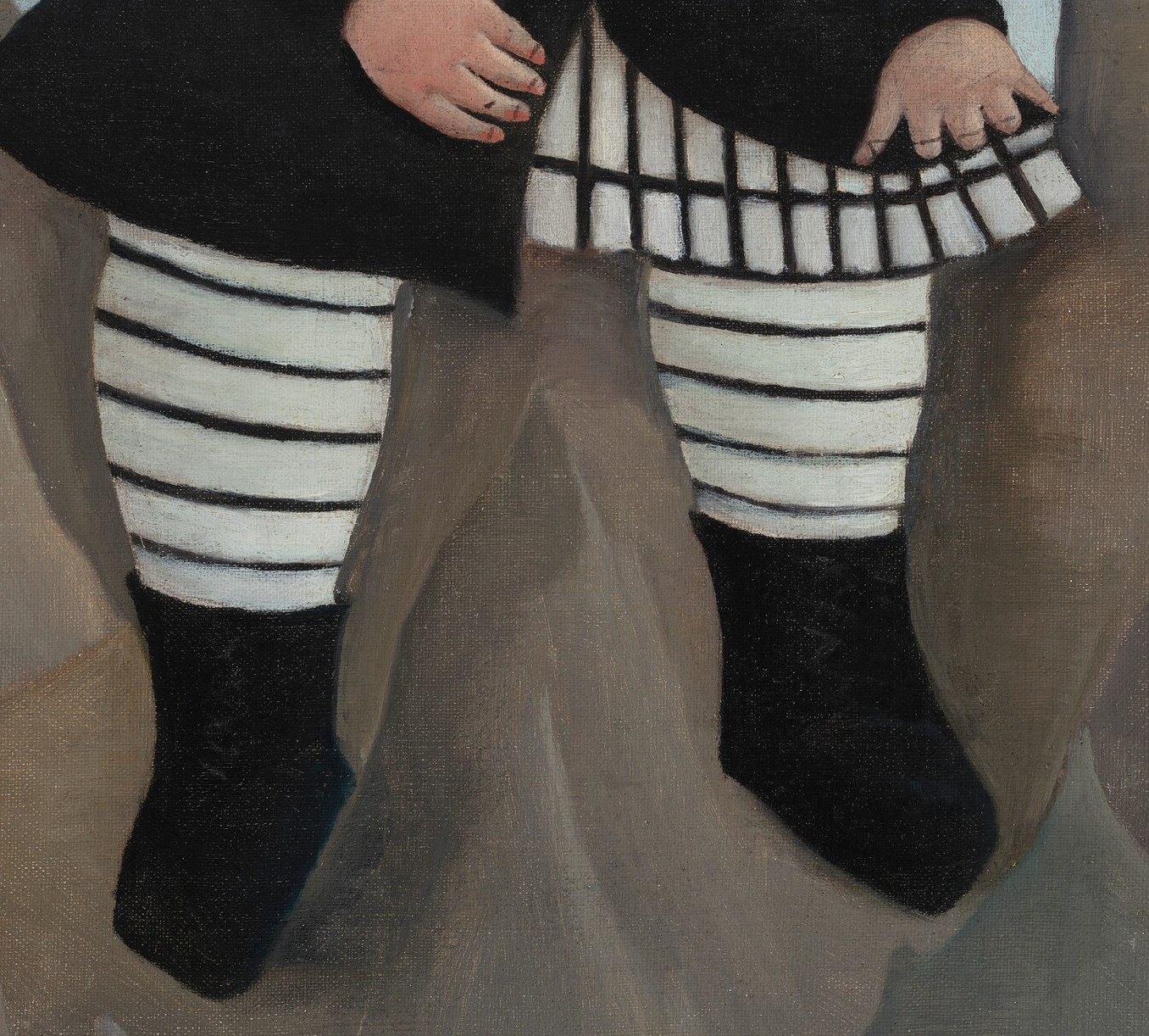His stark striped leggings are a bold, unnatural pattern.