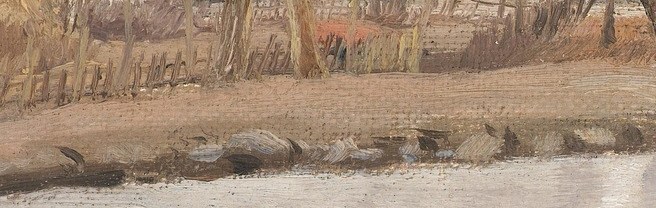 Look closely by the weathered wooden fence.