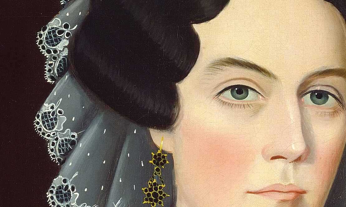 Eyes are the psychological anchor , their fixed, frontal stare creates the eerie intimacy characteristic of folk portraiture and holds the viewer's attention.