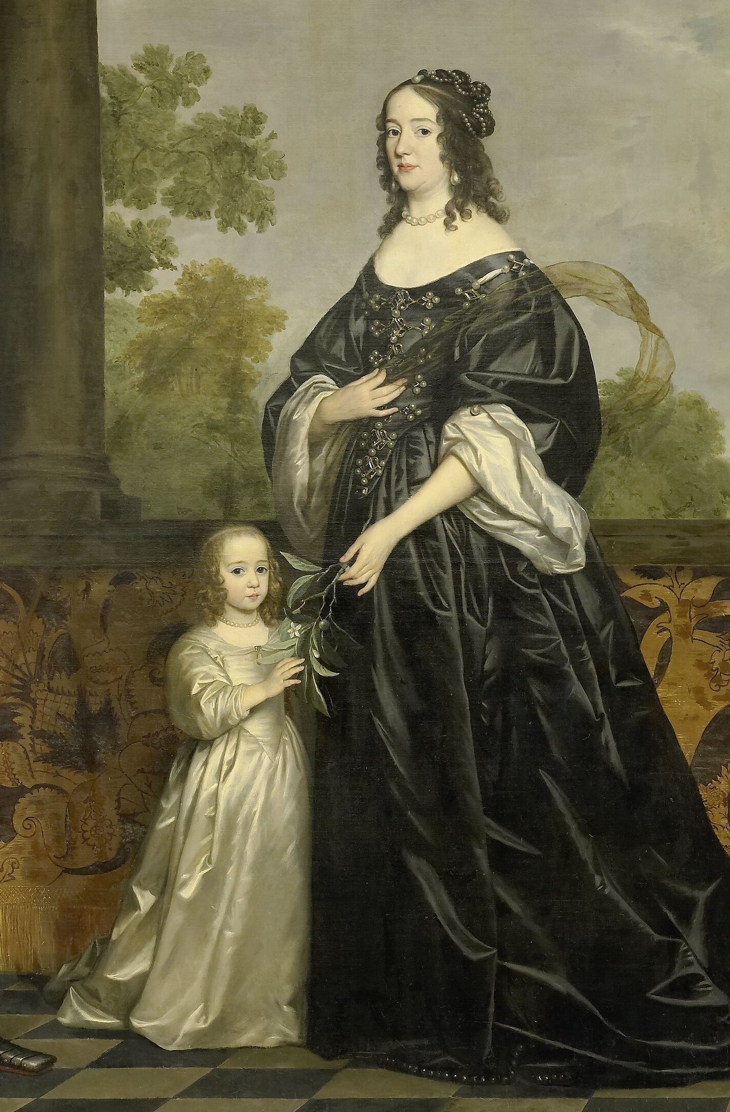 His wife, Amalia van Solms, anchors the family.