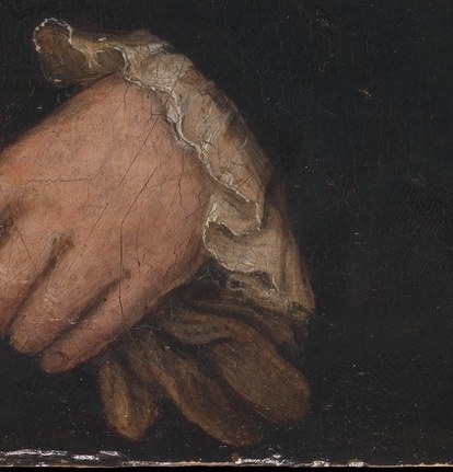 He holds a pair of gloves, a common pose for the elite.