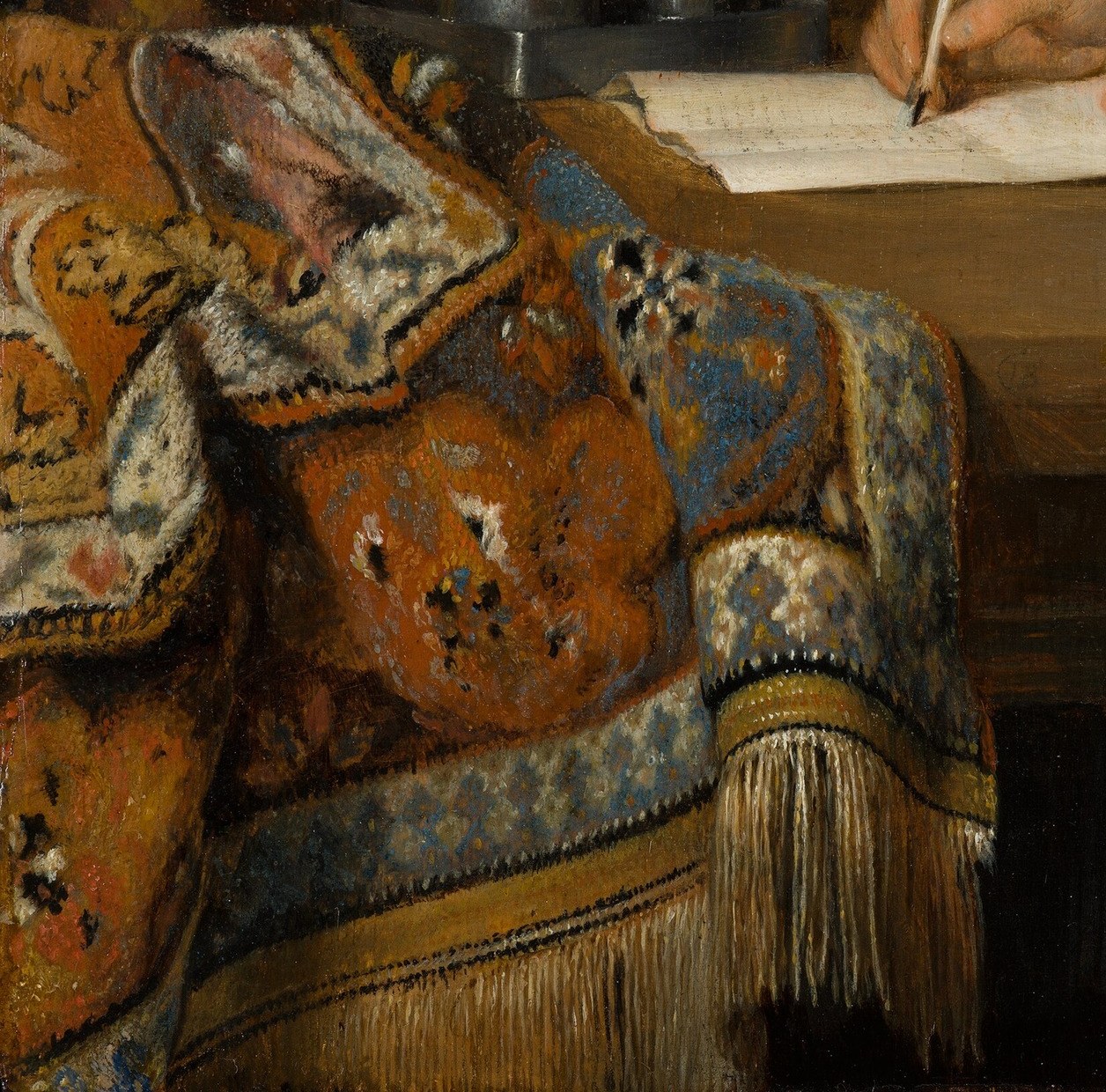 A carpet on the table, not the floor. That meant trade wealth.