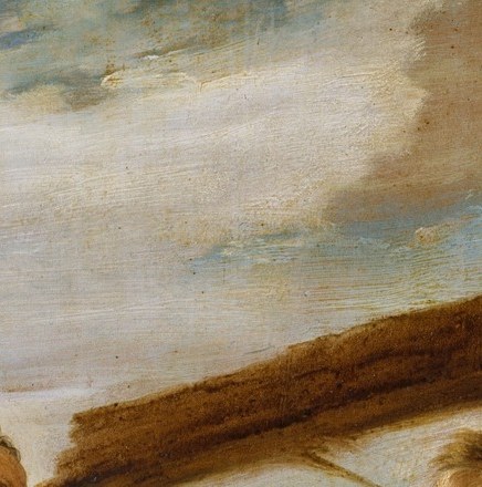 The older man points directly at the younger man's eye.