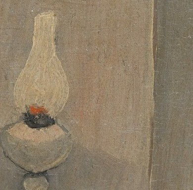A warm glow comes from the oil lamp.
