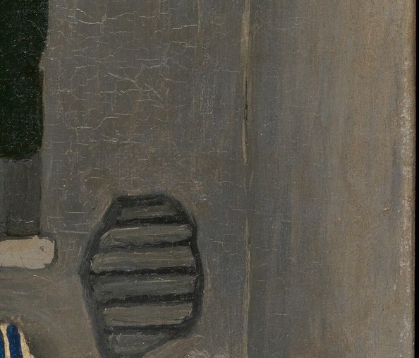 The cracked wall shows the artist's struggle.