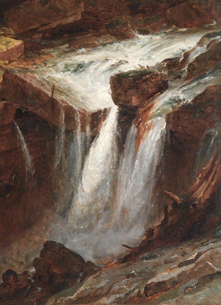 The waterfall cascades, illuminated by the storm's light.