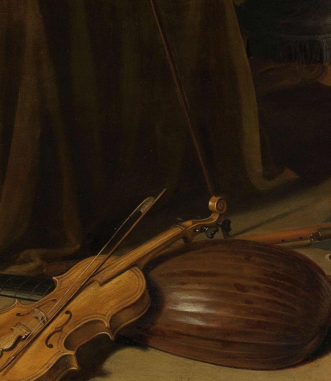 Music as pleasure that cannot be held; the instrument is silent and prone, its strings slack , a visual pause rather than a note.