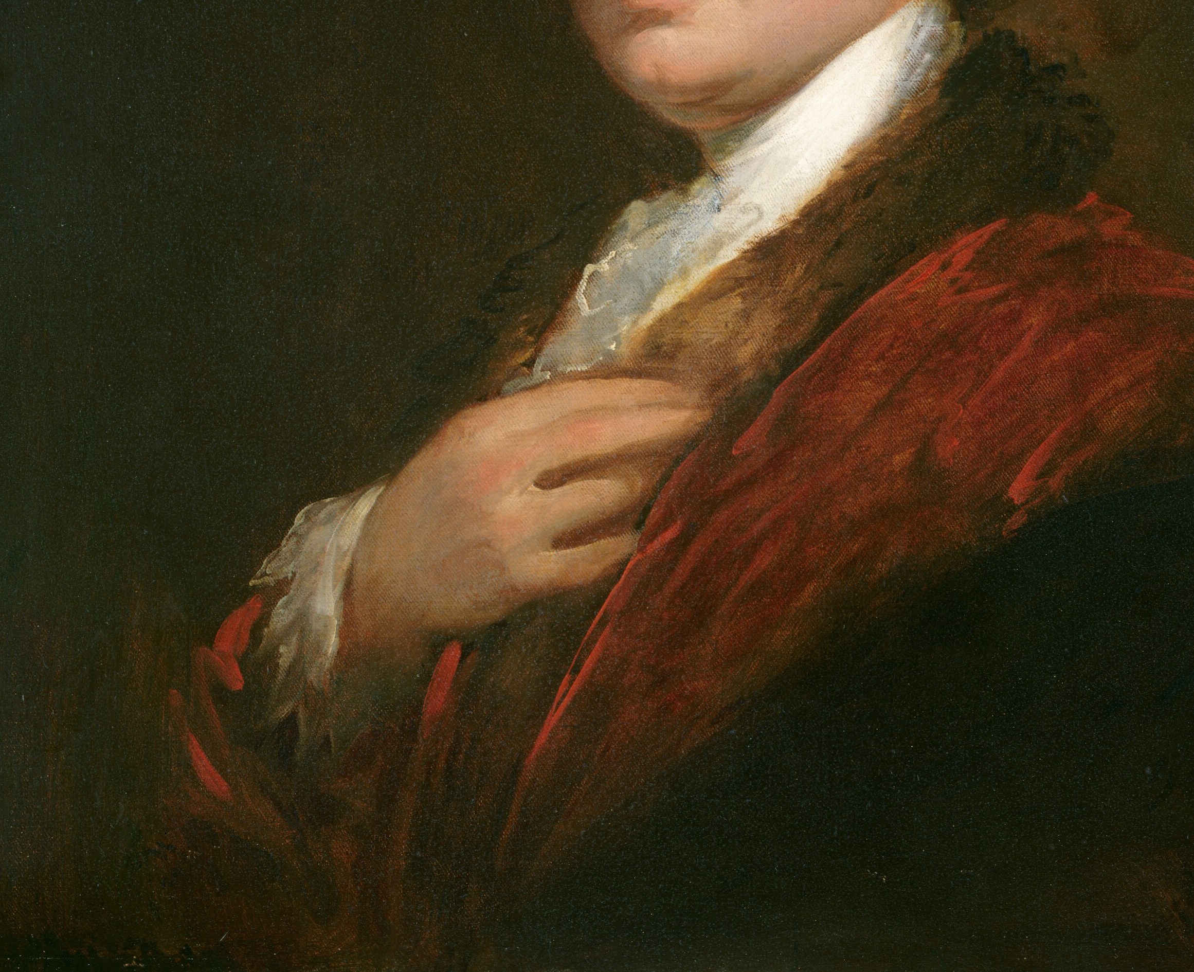 Rich burgundy-red velvet fills nearly half the canvas, indicating wealth and professional status; the nap texture and reflected light are among the most tactilely convincing passages.