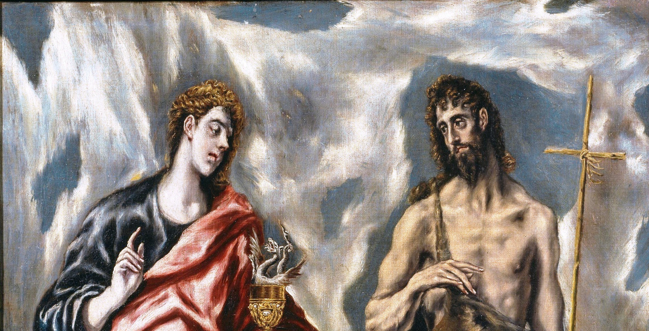 The dramatic, swirling sky is characteristic of El Greco's style.