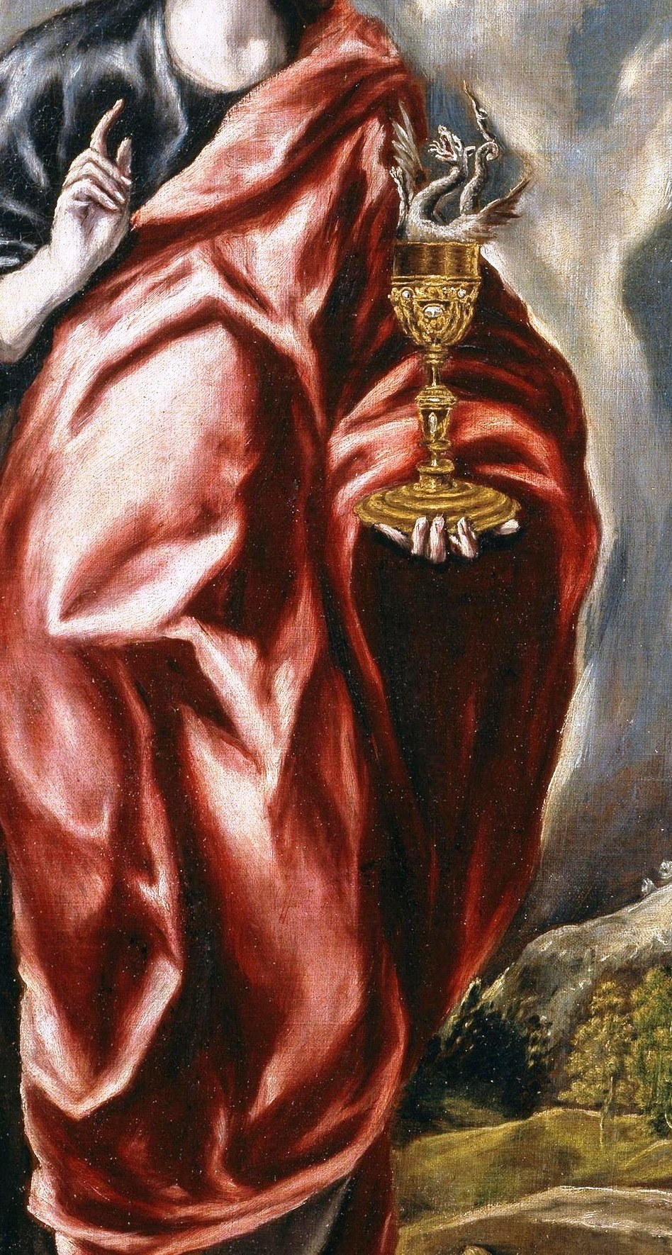 Saint John the Evangelist wears a dramatic red robe.