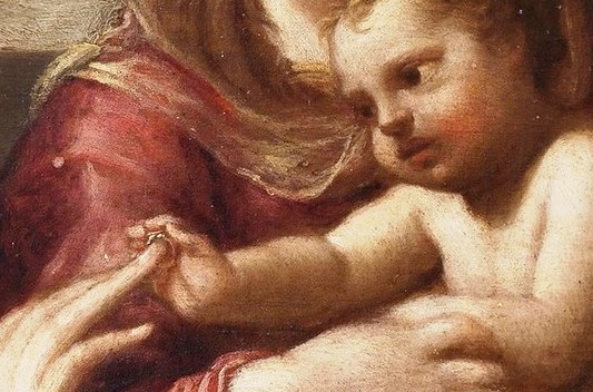 Mary's hands cradle the child gently.