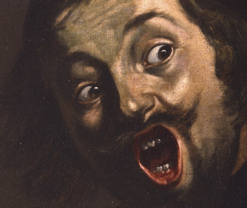 This man seems to be screaming.
