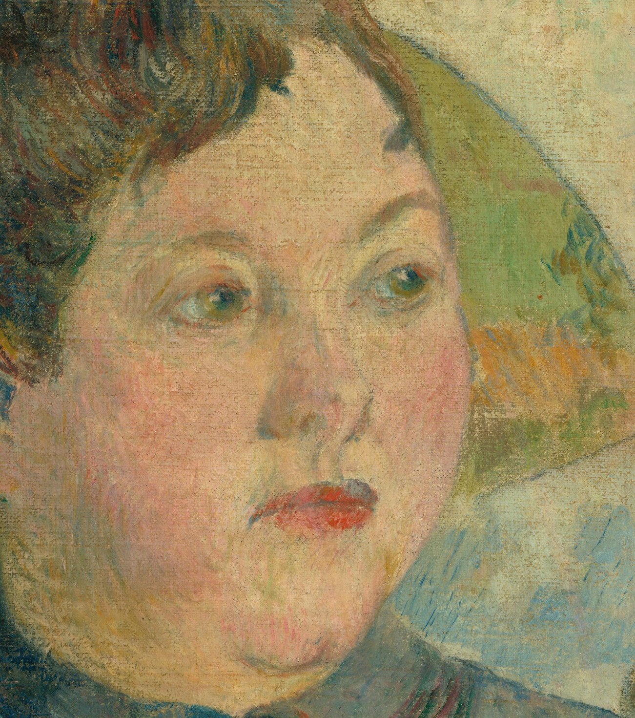 Her gaze is averted, suggesting introspection or perhaps a subtle defiance, characteristic of Gauguin's psychological portraits.