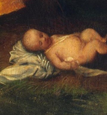 The Christ Child, in a humble manger, glows with light.