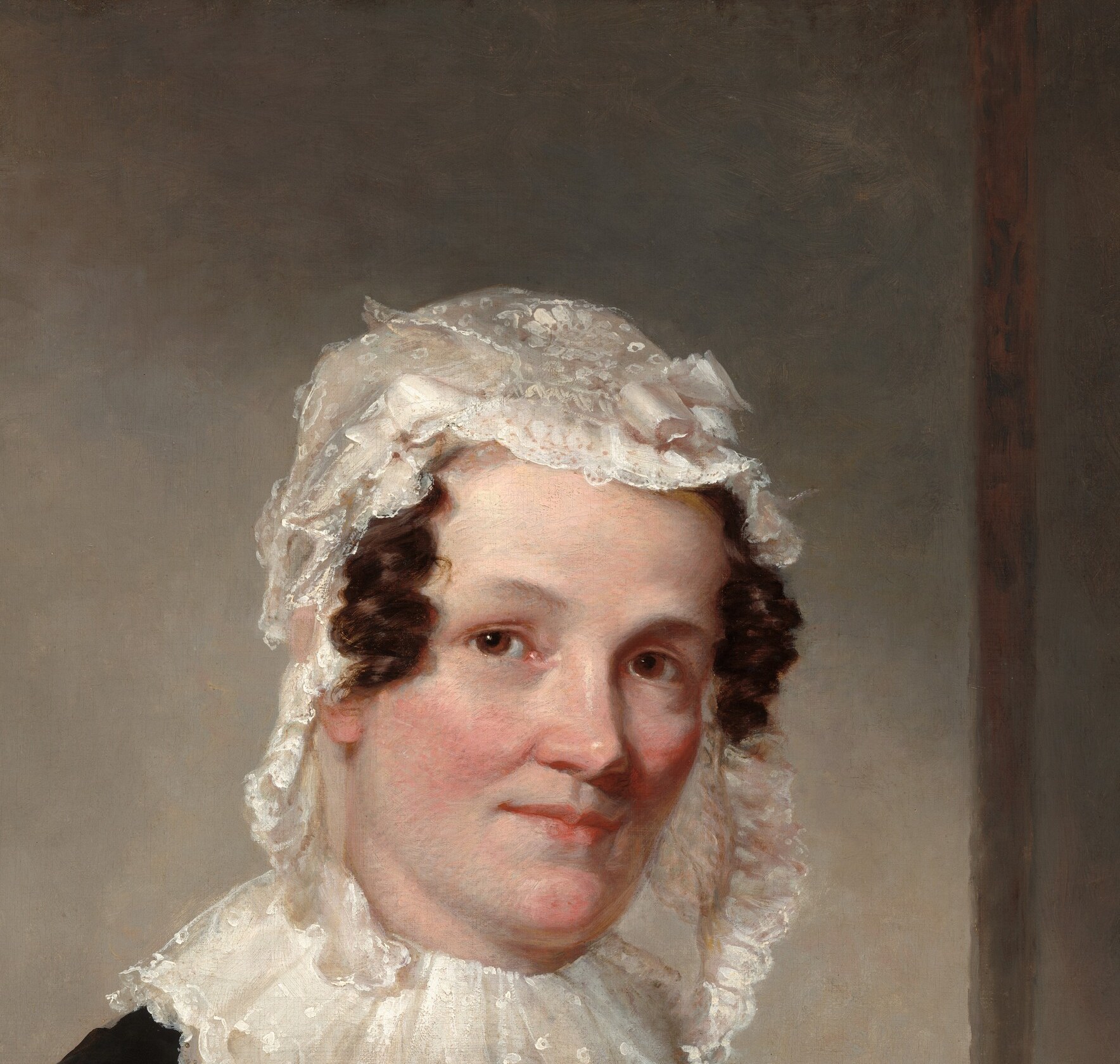 The sitter, Lydia Coit Terry, looks out with a steady gaze.