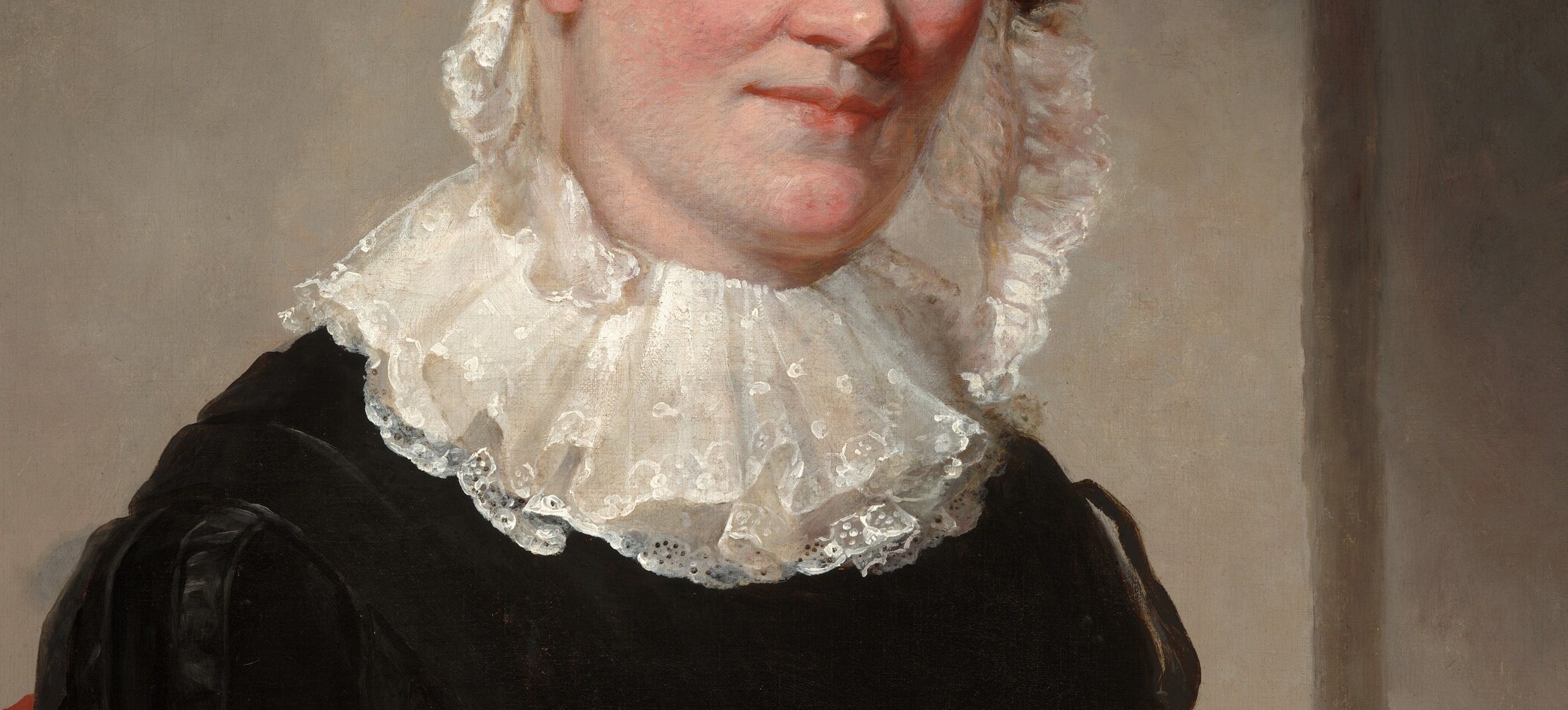 The collar's looping lace pattern contrasts sharply against the black dress, drawing the eye downward and framing the face; a detailed close-up would reveal Morse's handling of fabric texture.