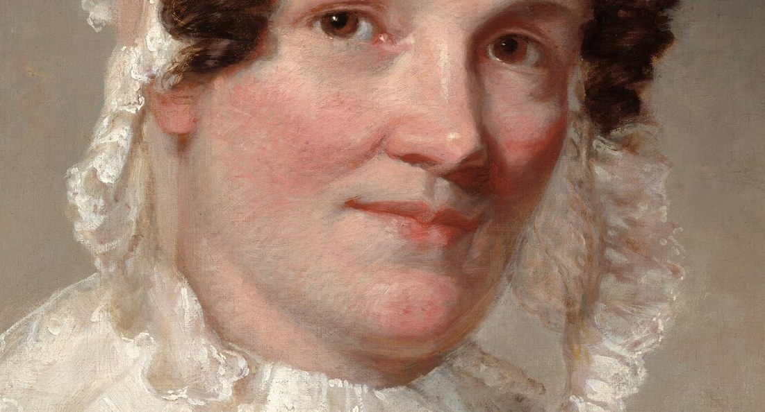 Yet the subtle set of her mouth hints at something more.