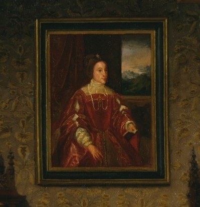 Beside him, a portrait of his late wife Isabella.