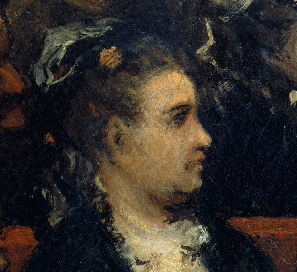 Most eyes turn to this woman in profile.