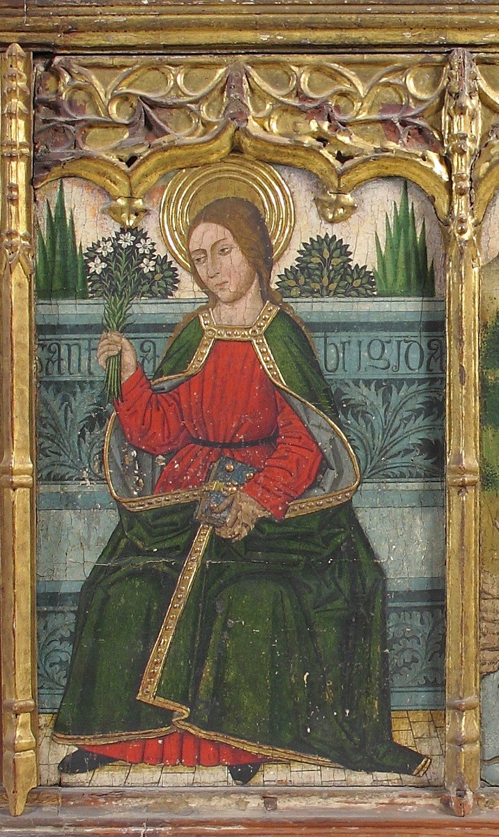 Female saint with halo and upright pilgrim or abbess staff; her frontal pose and carefully layered garments are characteristic of 15th-century Aragonese devotional figure painting and invite comparison with the two male saints flanking her.