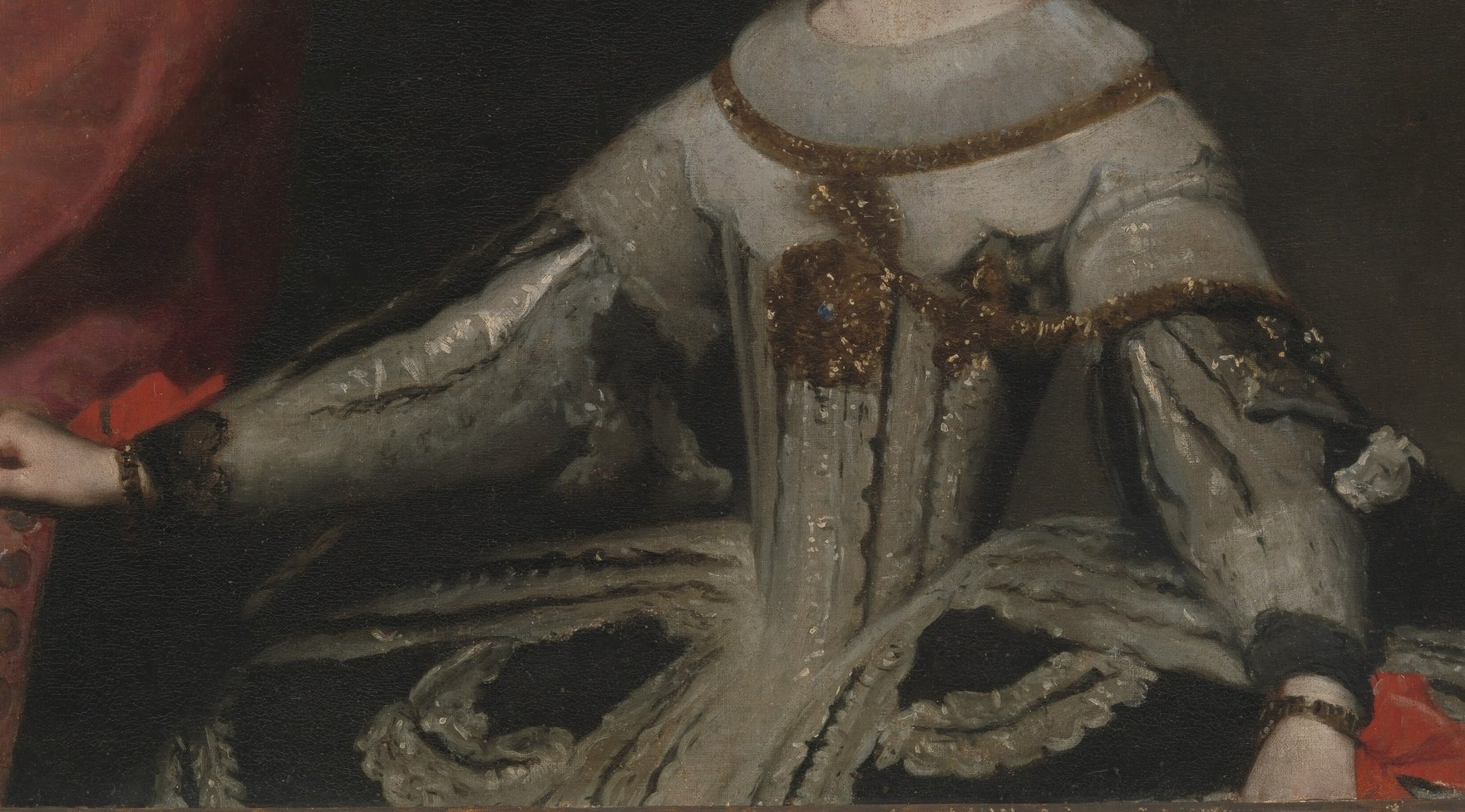 The dress is silver brocade, stiff enough to stand on its own.