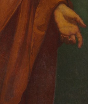 His open hands offer a gesture of blessing.