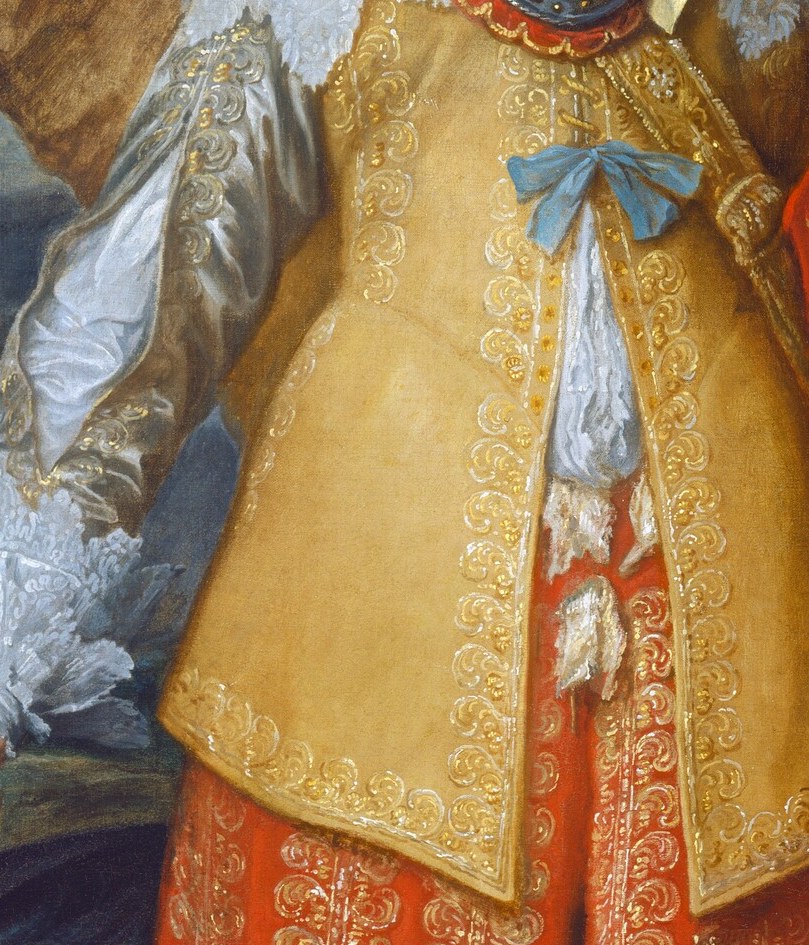 The blue sash across his chest marks him as a Knight of the Holy Spirit.