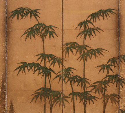 The vibrant green bamboo stands out against gold leaf.