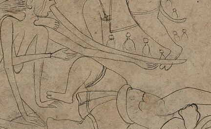 Beneath her: a lion. Her mount. This is Durga.