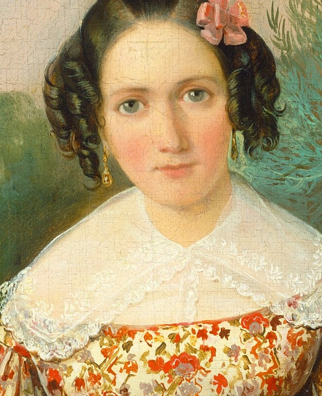 The painter captures her serene expression, almost a smile.