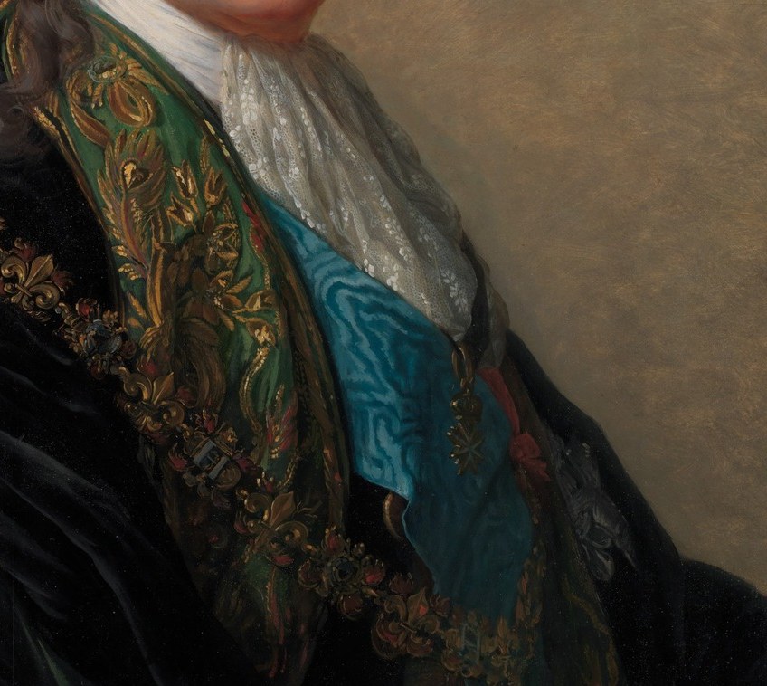 His ornate collar, heavy with gold, screams aristocratic wealth.