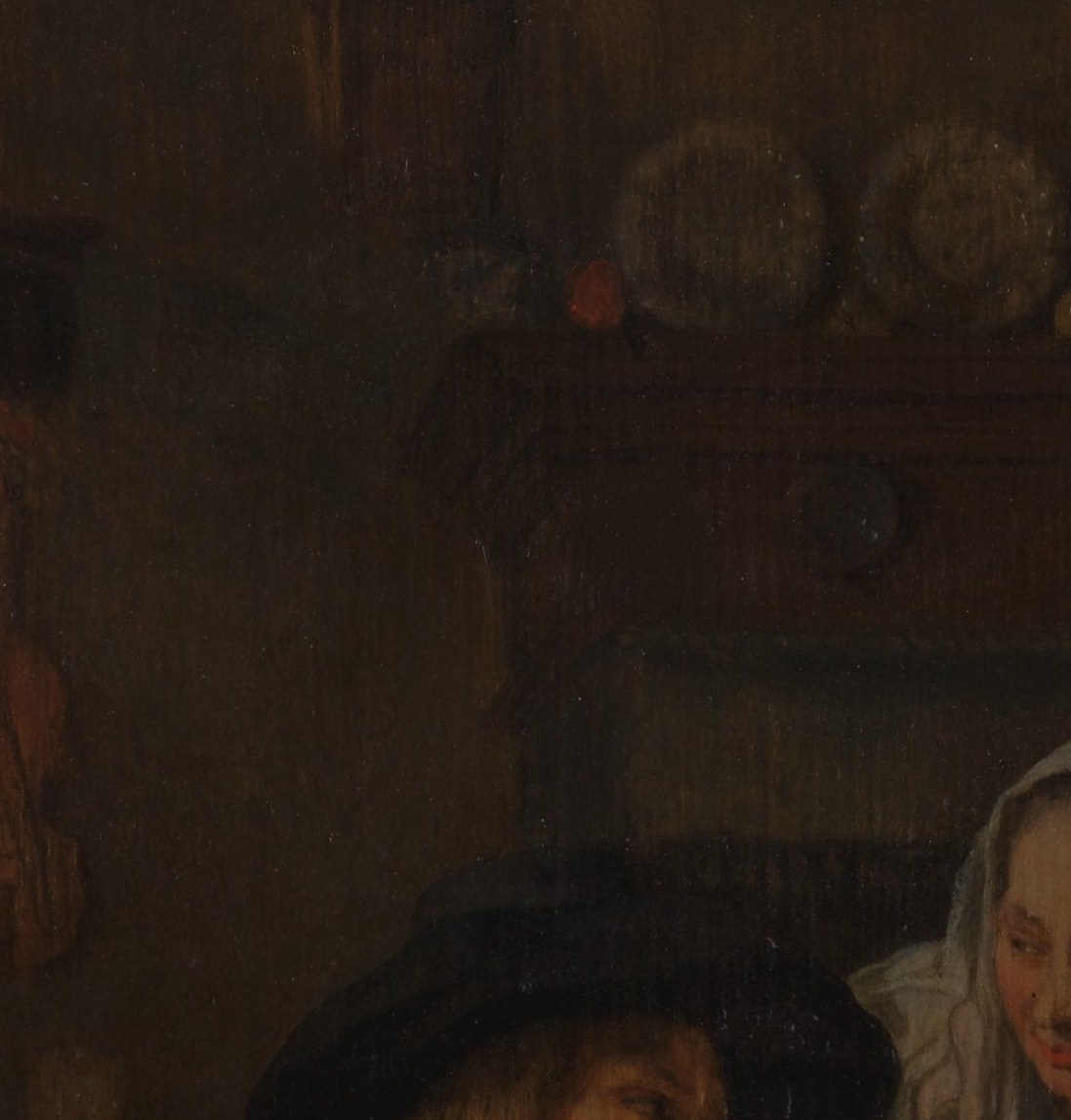 The painter used her to light the man's face.