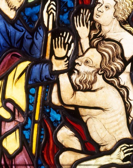 His hands are the emotional fulcrum of the window.
