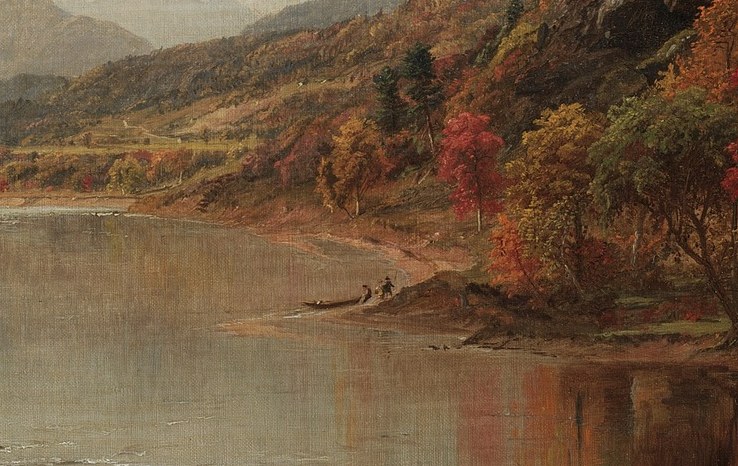 The sky and autumn leaves live perfectly mirrored in the river.
