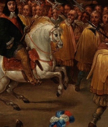 He rides a powerful white horse.