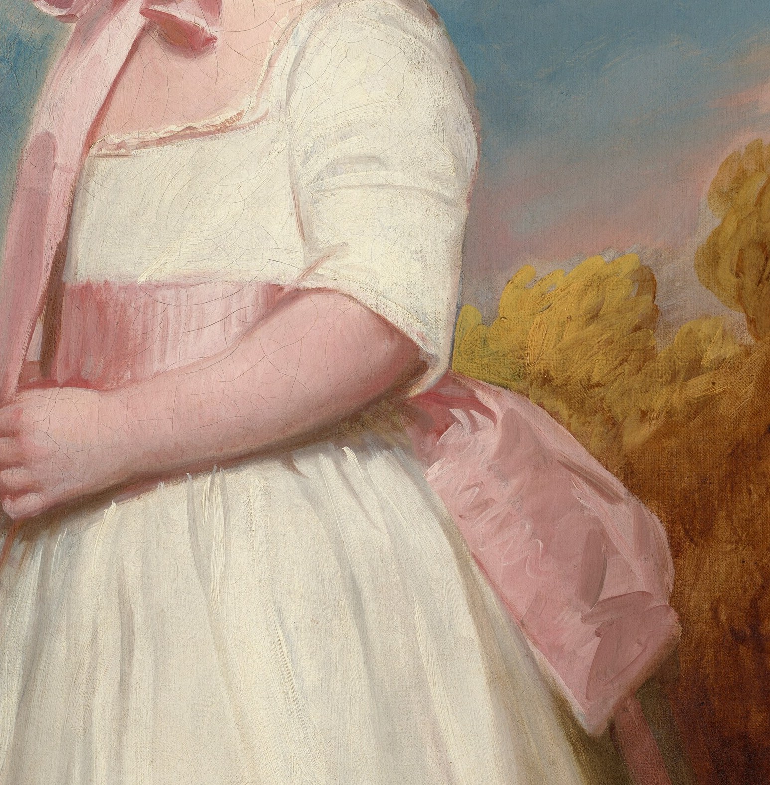 But the wide pink sash tells a different story.