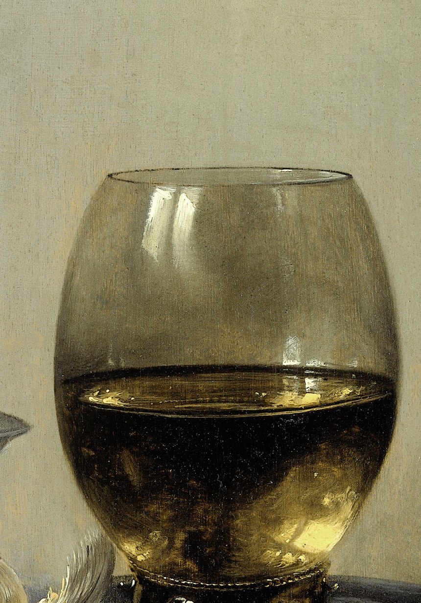 Transparent glass, dark wine, and a room reflected inside it. All at once.