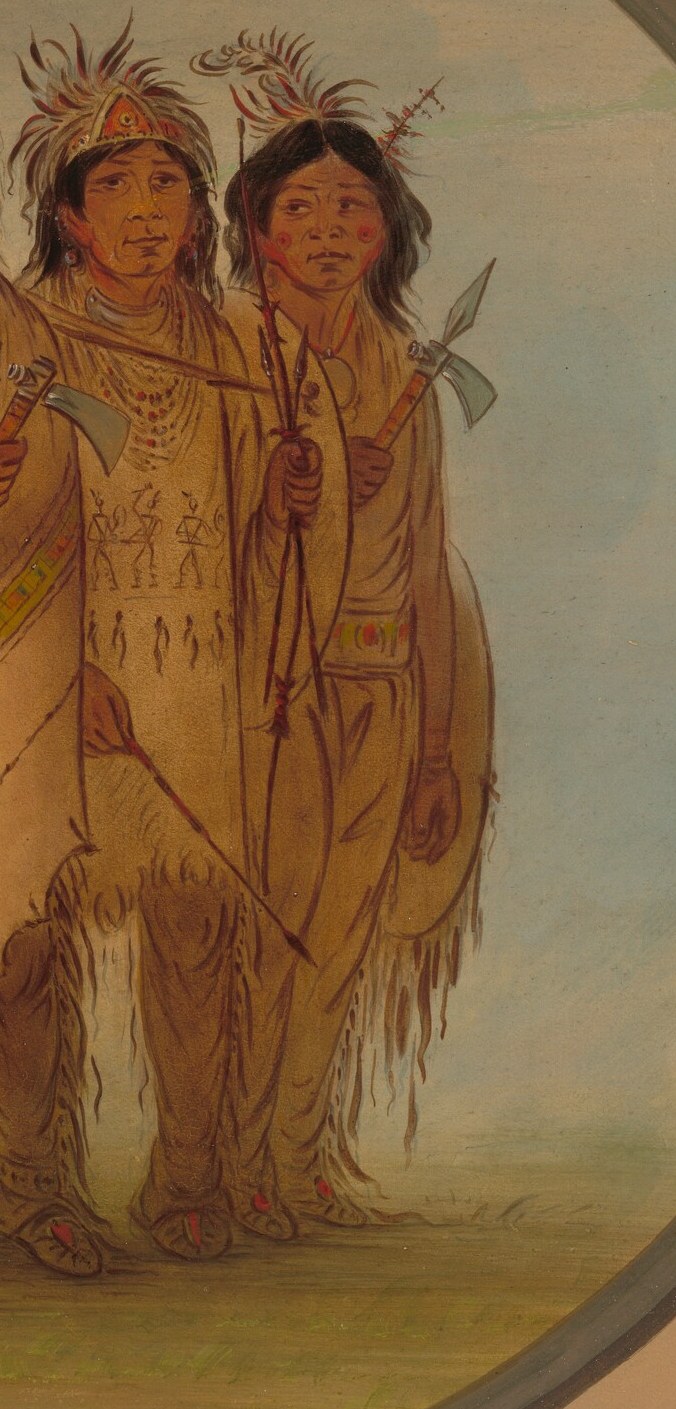 And this man carries a feathered spear, a symbol of defense.